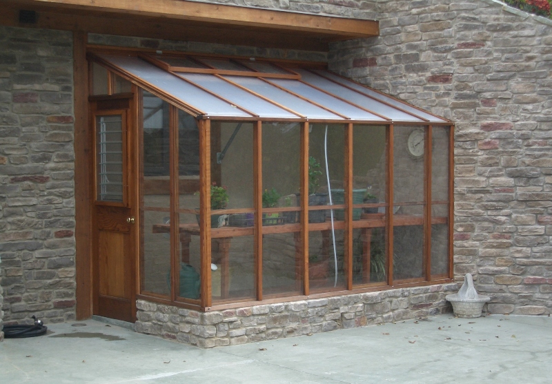 Custom 9 x 11 Deluxe Glass-to-Ground Lean-to greenhouse attached one end