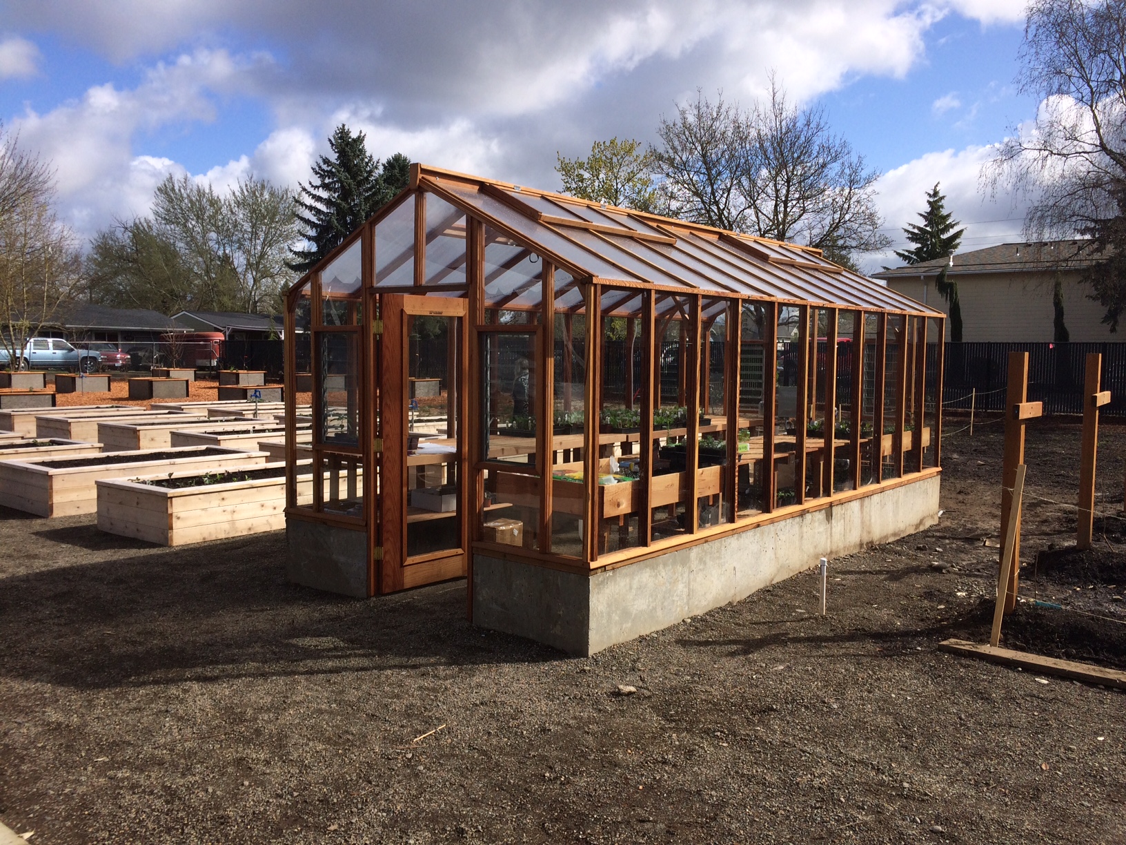 9x20 Deluxe Glass-to-Ground with two jalousie windows and Full Lite door on 18" high concrete base wall