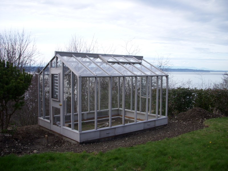 Glass-to-ground greenhouse in Seattle, WA