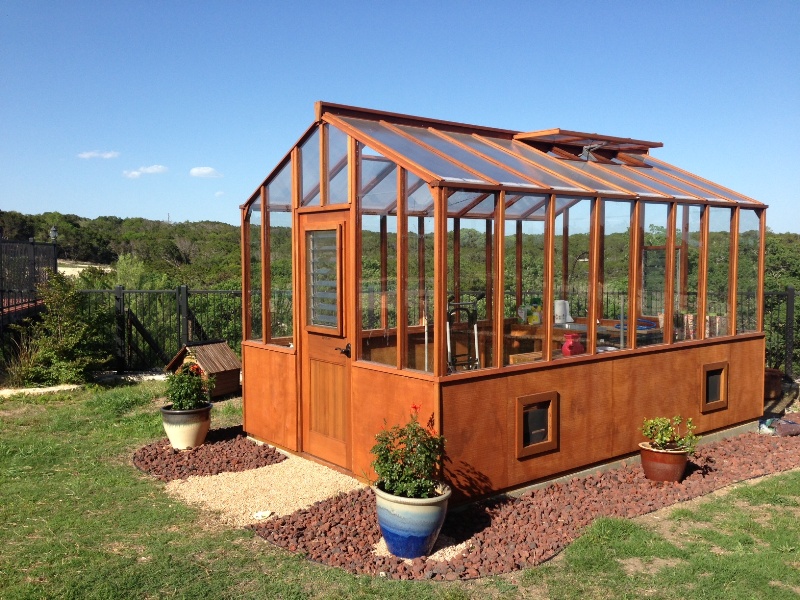 Redwood greenhouse Texas with twin wall roof