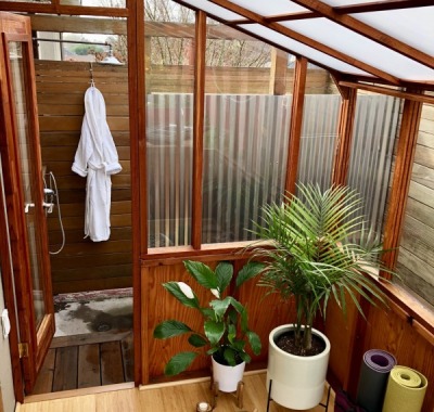 6x9 Deluxe Regular Lean-to with White Twin Wall Thermal Option used as a yoga studio