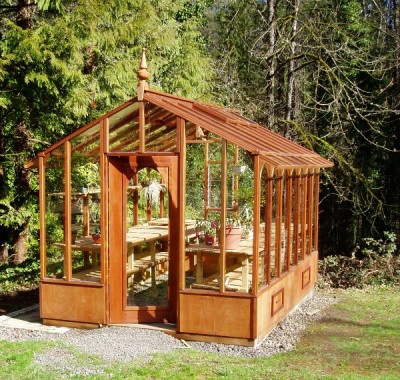 Sturdi-Built Garden Deluxe redwood greenhouse display
