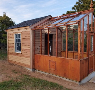 9x9 Garden Deluxe Attached greenhouse on custom 32" high Sturdi-Built base wall attached to garden shed