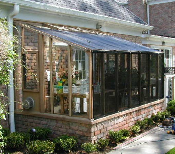 Garden sun room greenhouse with shade cloth