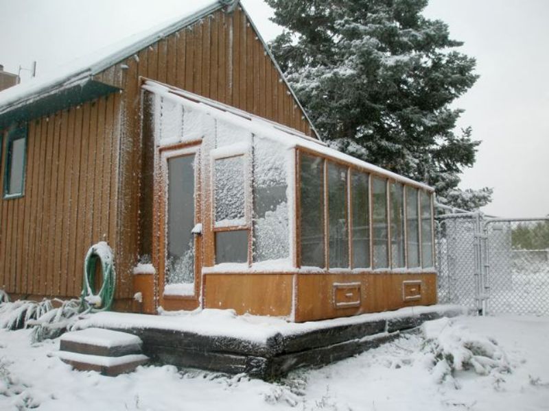 Garden SunRoom greenhouse in Snow