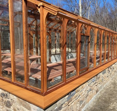 Back side view 12x23 Nantucket on stone base wall
