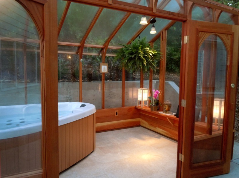 Interior of greenhouse with hot tub