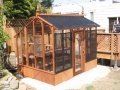 Small greenhouse with shade cloth