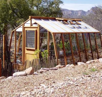 Home greenhouse in desert with jalousie window