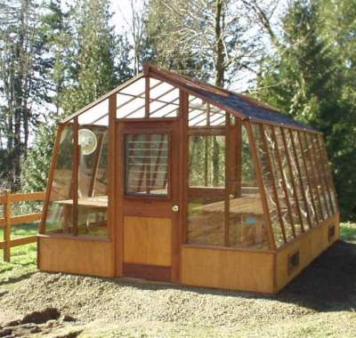 11x18 Solite garden greenhouse set on a 18" Sturdi-Built wood base wall