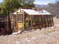 Home greenhouse in desert with jalousie window