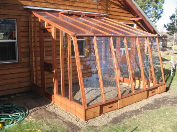 9 1/2' x  11' Solite Lean-to with doors at both ends  on 9.5" Sturdi-Built base wall