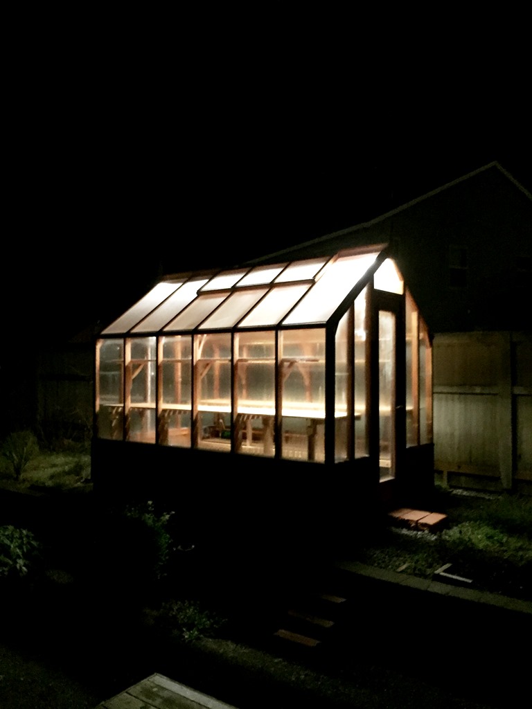 7x11 Trillium exterior at night with grow lighting