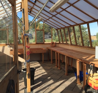 Interior of large home redwood greenhouse