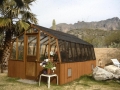 Redwood greenhouse with shade cloth