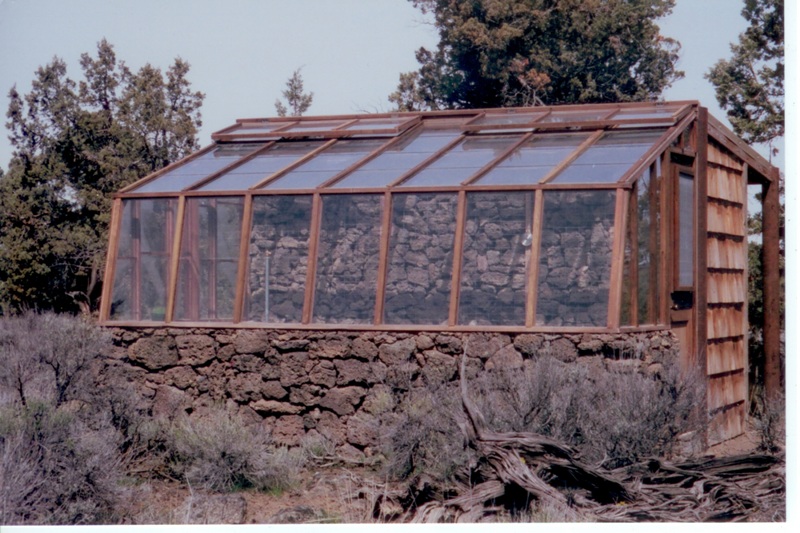 Lava rock base wall lean-to greenhouse