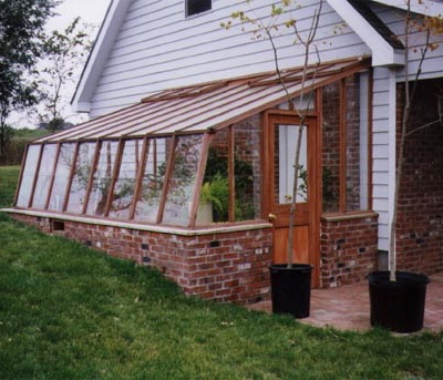 Redwood greenhouse built into ground