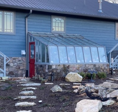 9x12 Tropic Lean-to greenhouse with stone base wall