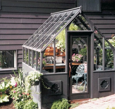 Compact Home greenhouse with steep roof