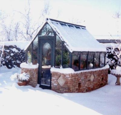 Garden greenhouse in snow, New Mexico