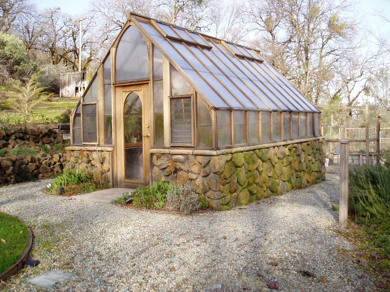 Redwood and Glass greenhouse on stone base