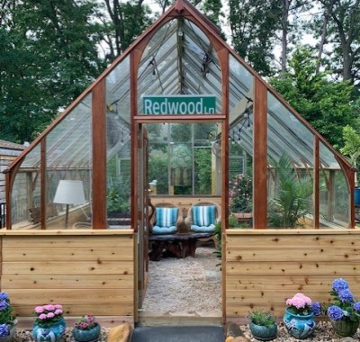 12x16 Tudor greenhouse on wood base wall