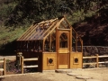 Home redwood greenhouse at a farm in California