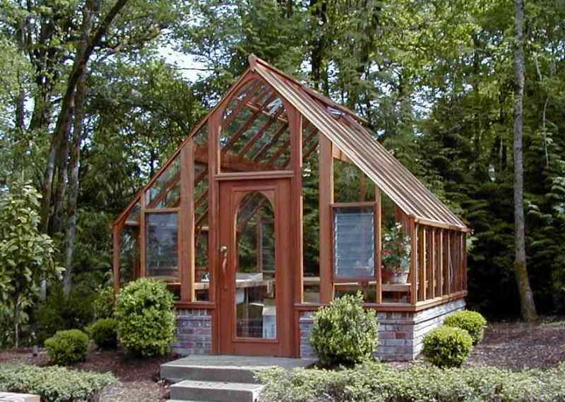 Greenhouse with Jalousie windows and brick base