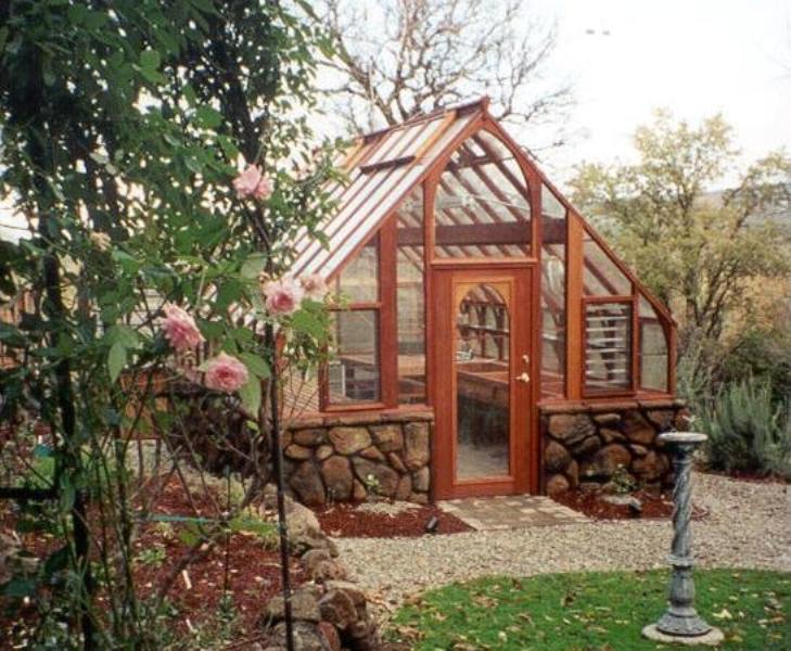 Redwood greenhouse on stone base