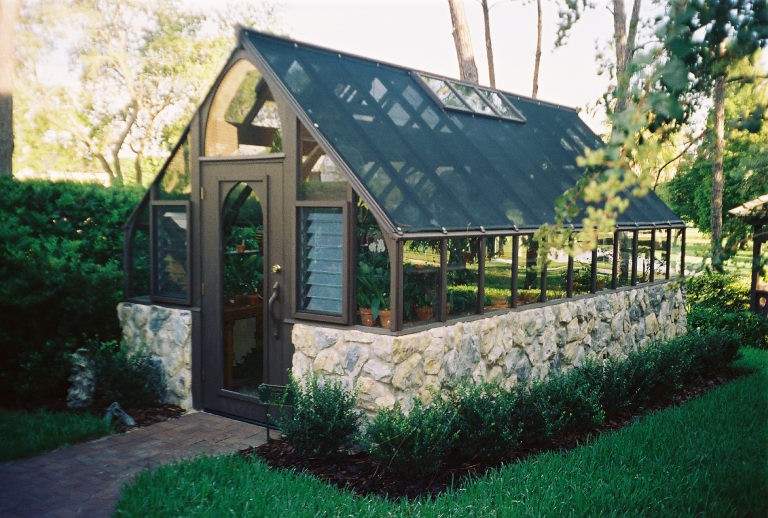 Home greenhouse with stone base