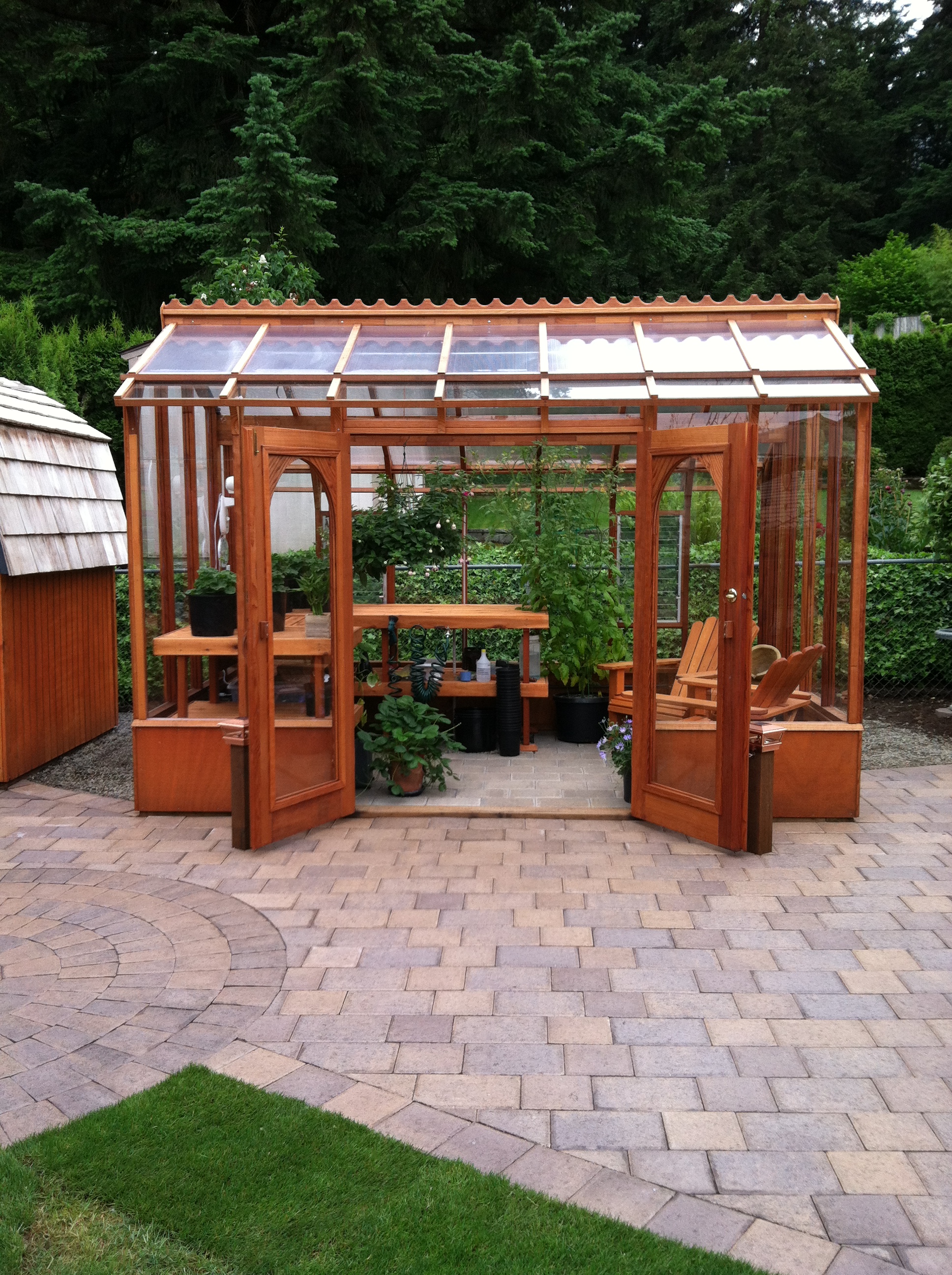 Nantucket Greenhouse With Seating Area. - Sturdi-Built Greenhouses